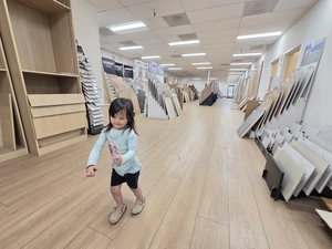 Vertical sample racks of hardwood and luxury vinyl plank