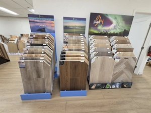 Laminate and luxury vinyl plank stacks with branded displays