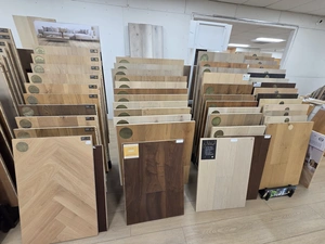 Wide variety of hardwood flooring samples on display stands