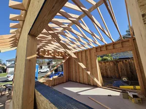 9Builders: Framing the Walls and Roof for a Spacious Home Expansion