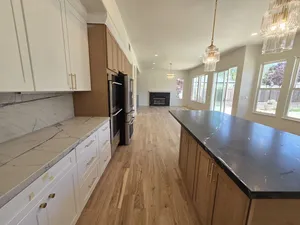 9Builders: Bright Kitchen with Custom Cabinets and Luxury Finishes