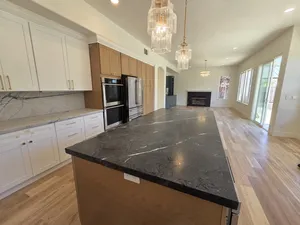 9Builders: Open Concept Kitchen with Stunning Marble and Gold Finishes