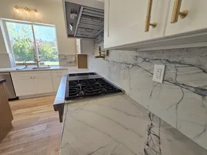 Sleek Kitchen Design with Appliances and Lighting