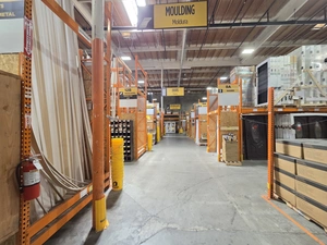 Moulding aisle with overhead category sign