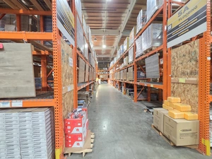 Cabinet and millwork aisle with floor-to-ceiling pallet racks