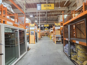 Electrical supplies aisle with overhead Electrical sign