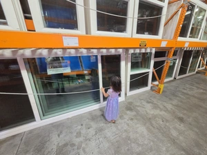 9Builders client family browsing sliding glass doors