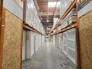 Pre-hung interior white door inventory aisle