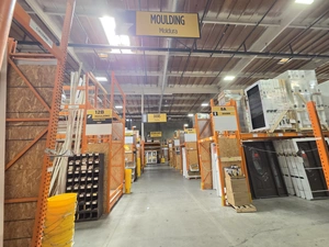 Moulding aisle with overhead category banner
