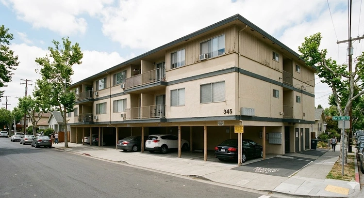 Soft story retrofit requirements in San Jose illustrated on a multi-unit apartment building with ground-floor parking