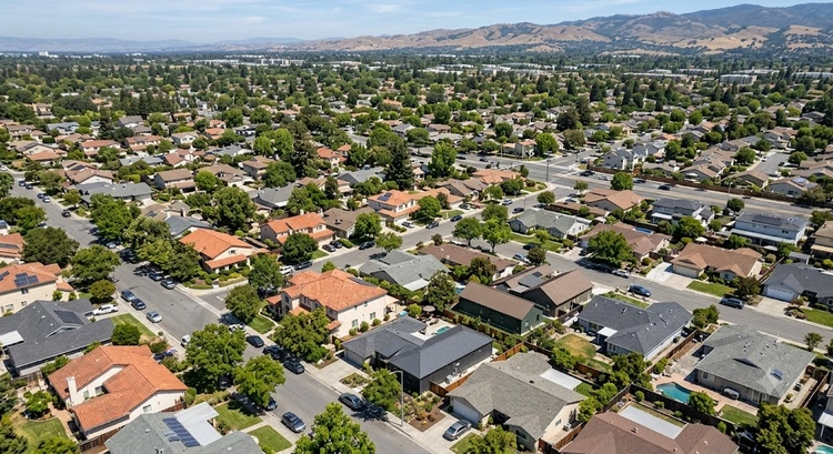Best roofing material San Jose home with tile and metal options visible on Bay Area residential street